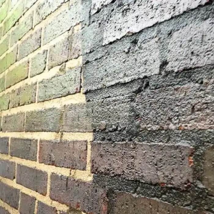 Paint removal from an industrial brick building in Bristol